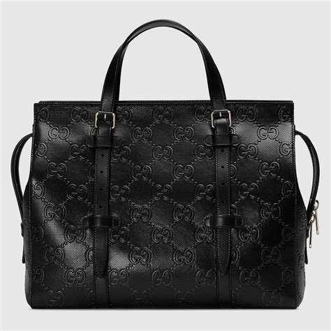 black embossed gucci bag|Gucci embossed clutch bag.